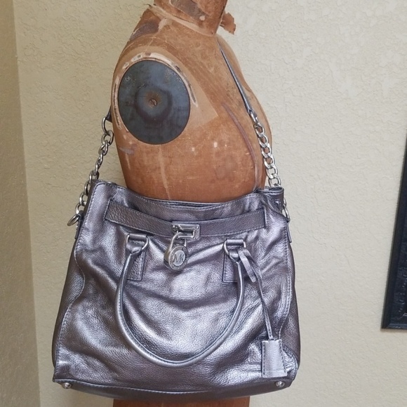 Michael Kors Handbags - SOLD...Pewter Leather michael kors purse with lock